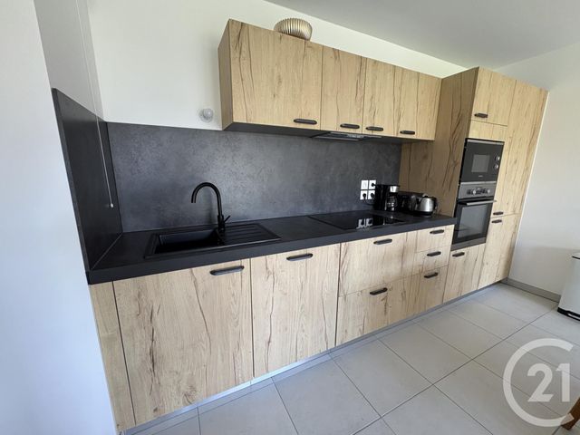 Appartement F3 à louer - 3 pièces - 63.37 m2 - BELLEVILLE EN BEAUJOLAIS - 69 - RHONE-ALPES - Century 21 Coquillat Immobilier